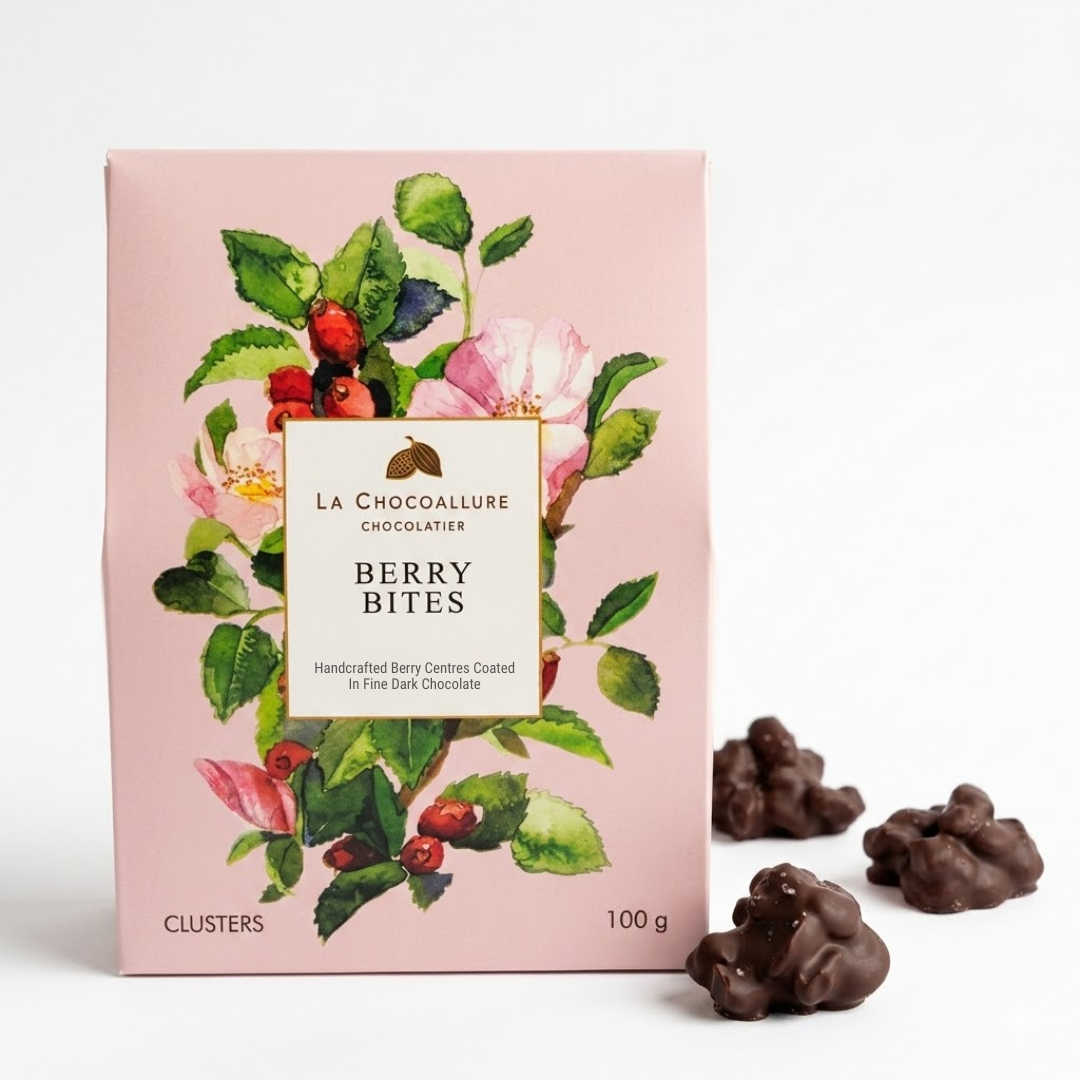 Box of La Chocoallure Berry Bites with chocolate clusters on a white background